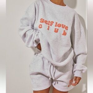 self love club sweater and runner shorts never worn!